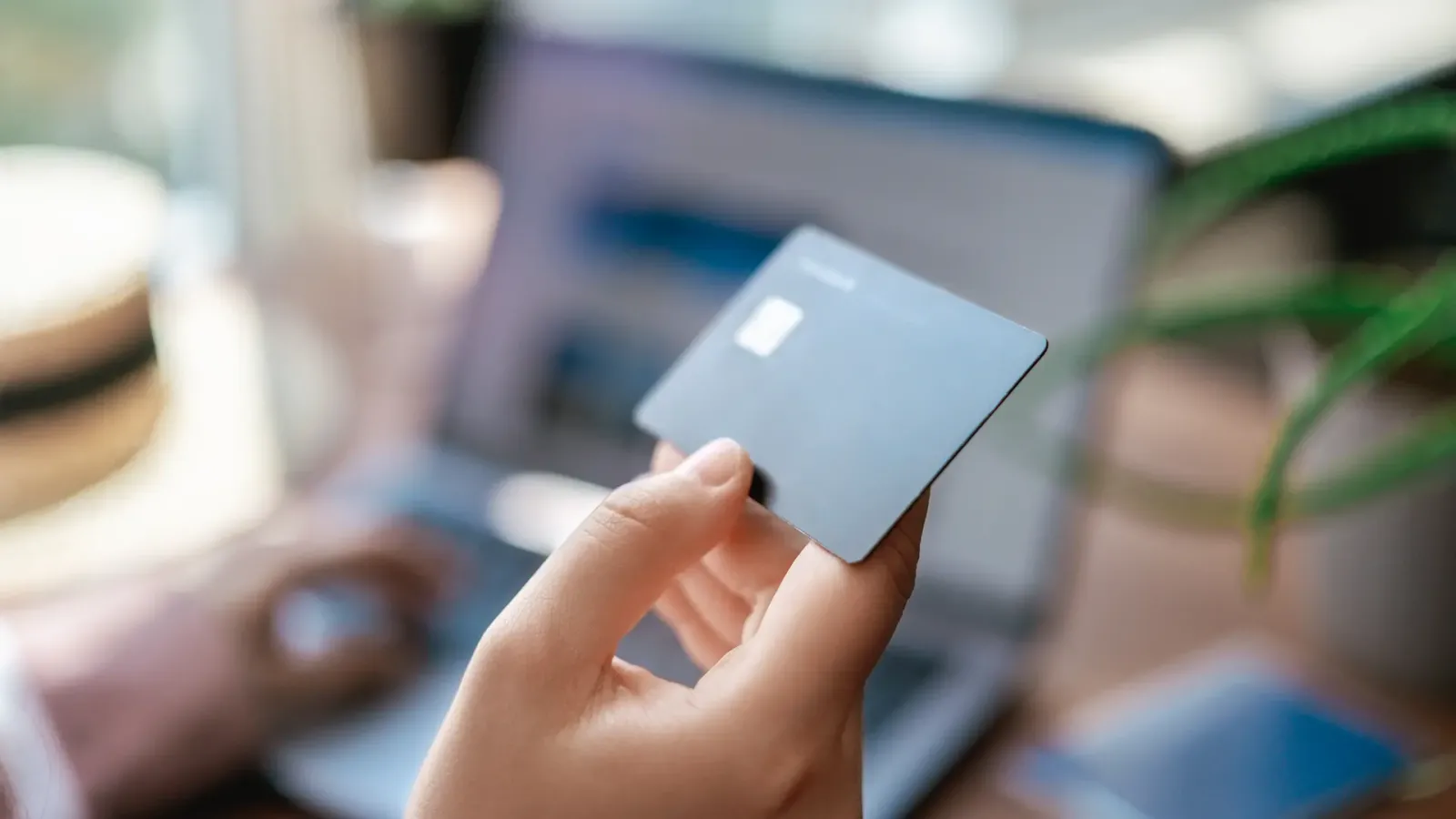 person banking on laptop